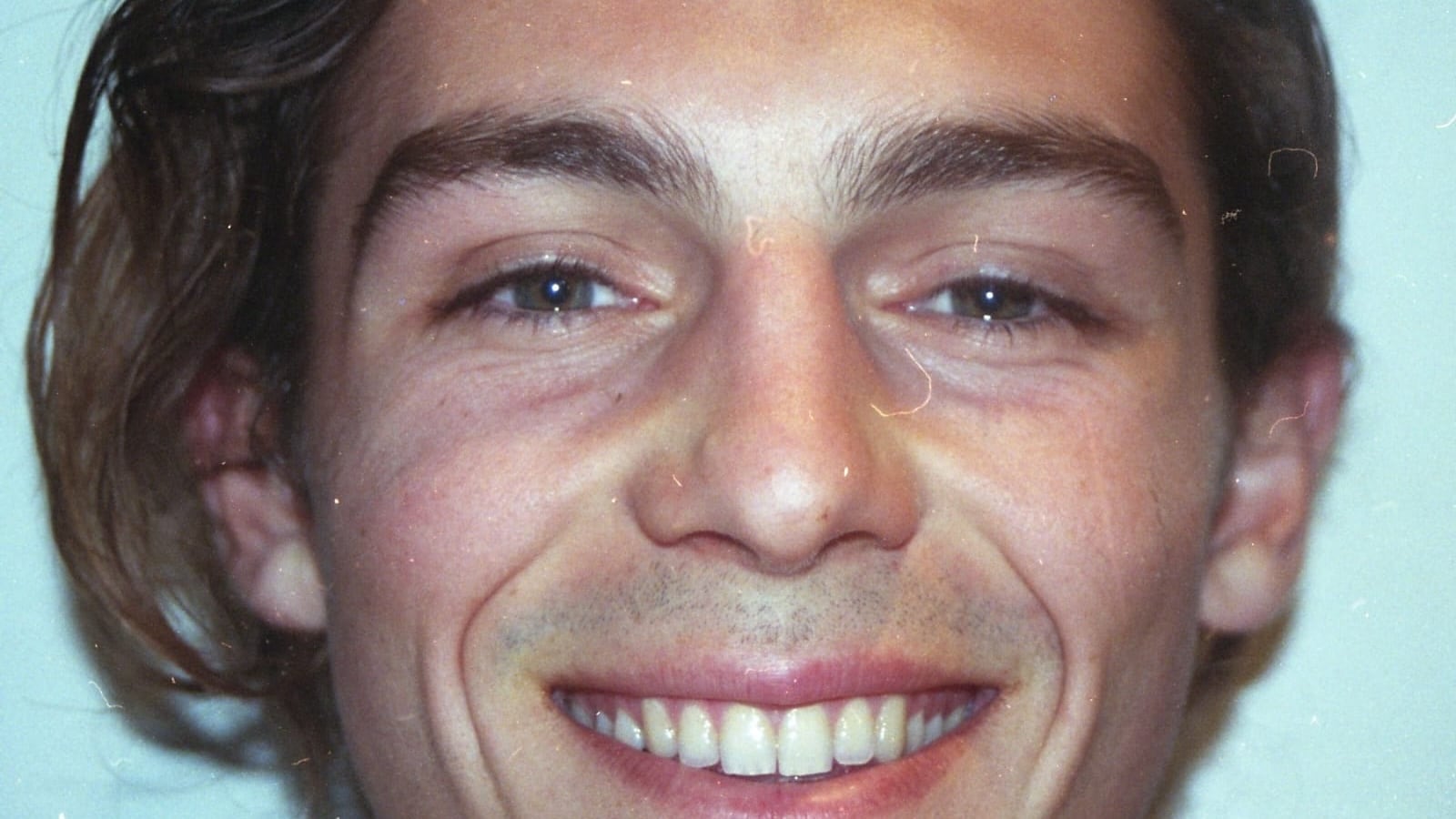 A close portrait of Matteo smiling.